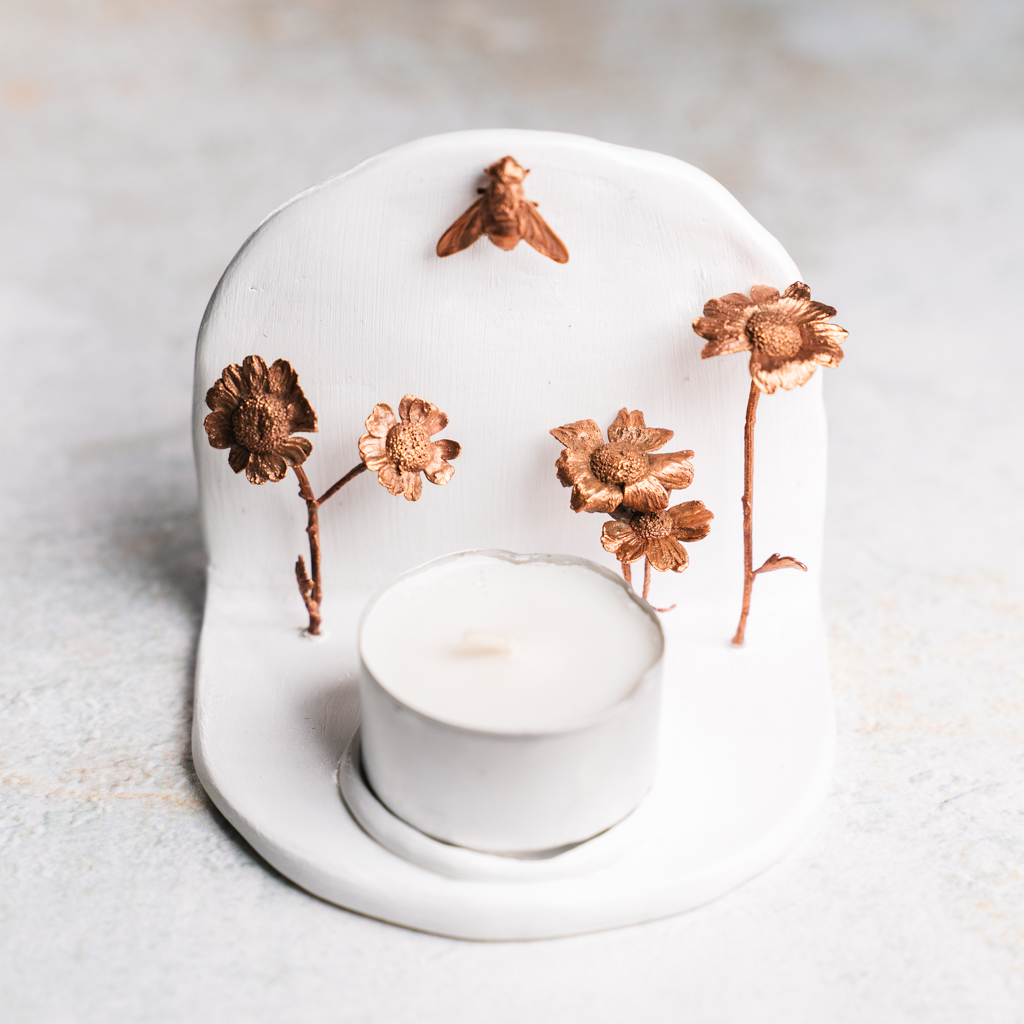 Kaarsenstandaard met moederkruid